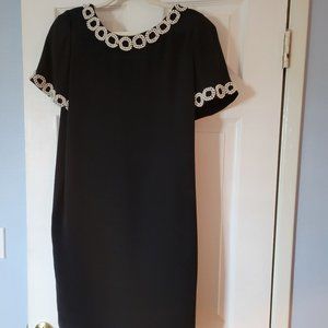 Classic black cocktail dress with pearl beading
